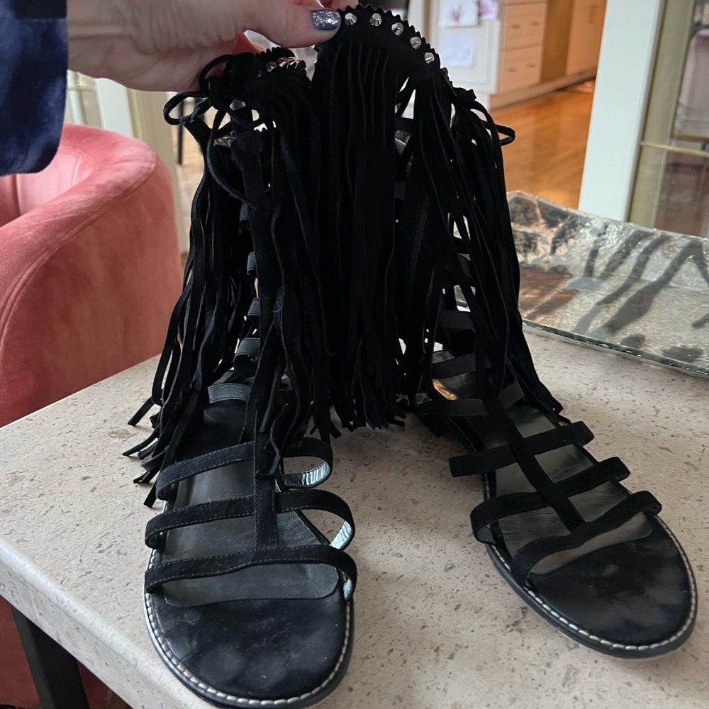 Great Stuart Weitzman fringed gladiator sandals. In very good condition.